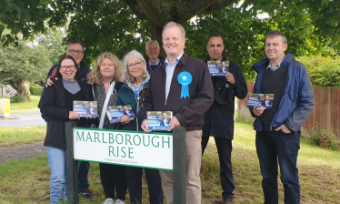 Andrew Williams with a canvassing team in Grovehill